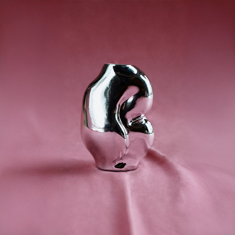 Petit vase en verre brillant chromé