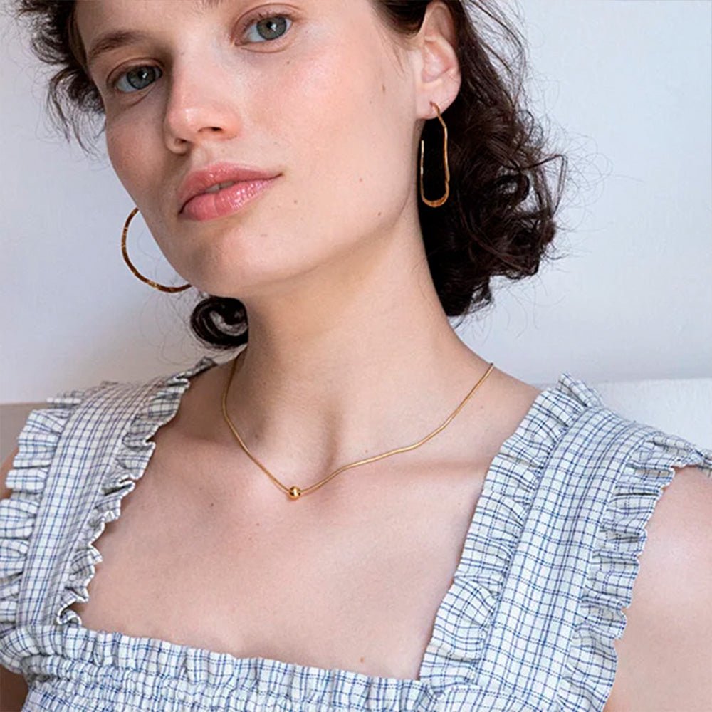 Collar bola oro