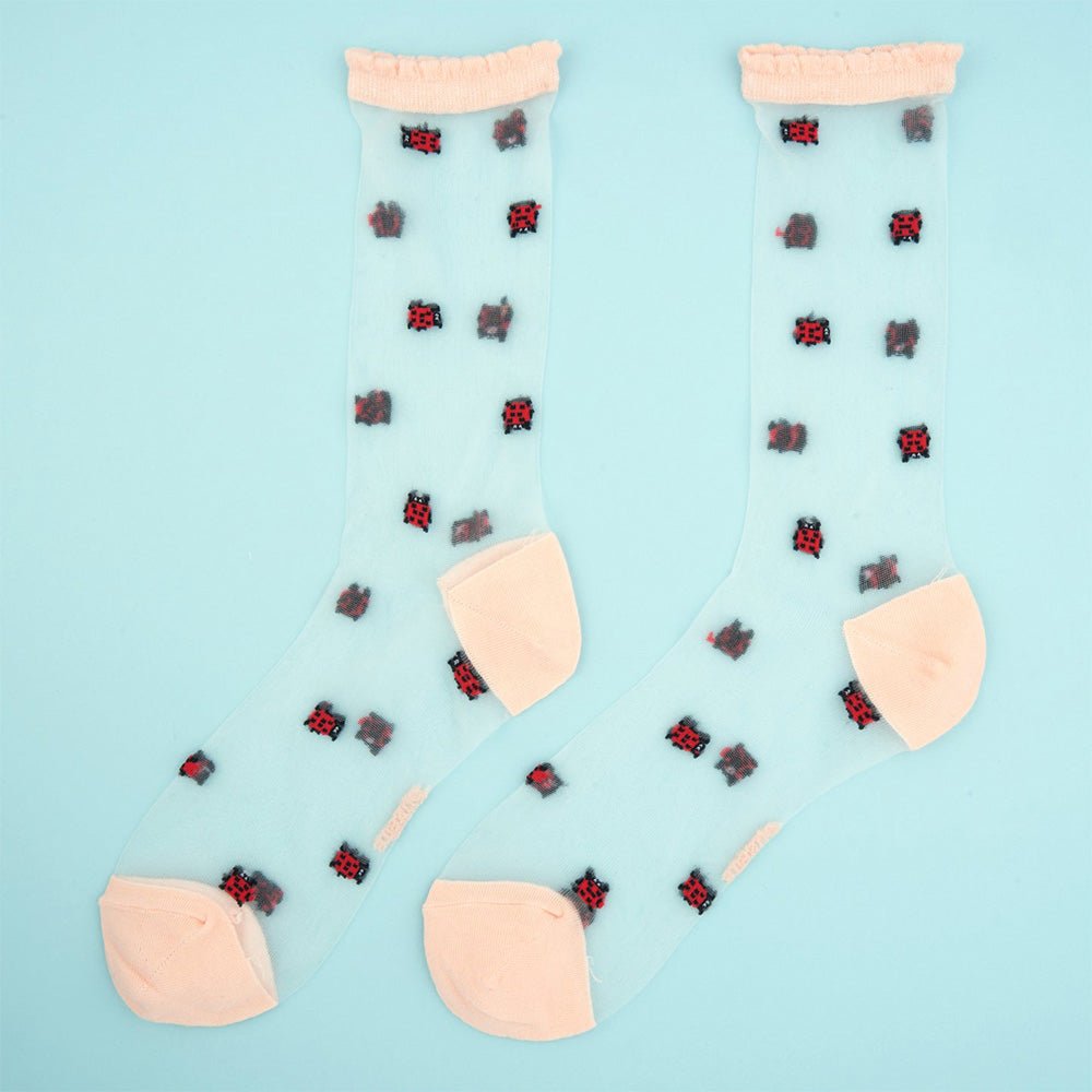 Chaussettes transparentes coccinelle