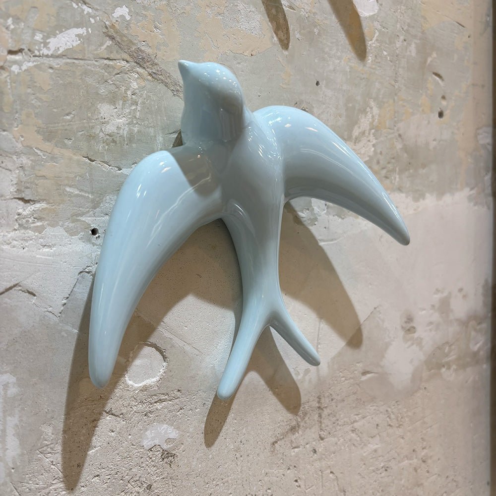 Trio of Light Blue Swallows
