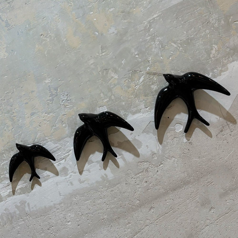 Trio of Black Swallows