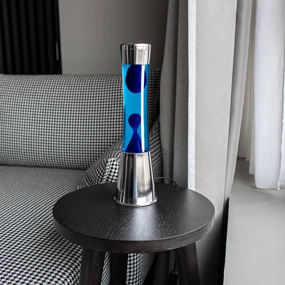 Lampe à lave avec socle chromé, liquide et lave bleus